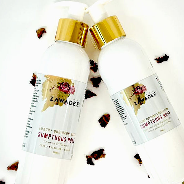 Set of oud scented body was and body lotion in a luxury white bottle with gold and white pump